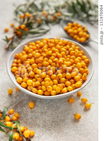 Sea buckthorn berries in bowl healthy eating concept Sea buckthorn berries in bowl healthy eating concept 131976064