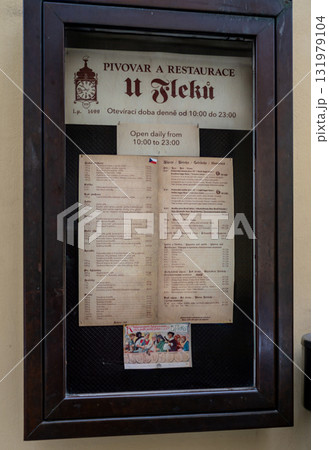 Prague, Czech Republic, August 7, 2023. A shot of the menu at U Fleku, the oldest and most famous brewery in the city. It's on a noticeboard near the entrance. 131979104