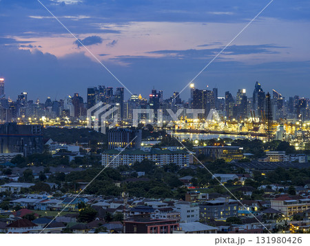 タイ・バンコク高層ビル群とチャオプラヤー川沿い工場地帯 / Bangkok. Thailand 131980426
