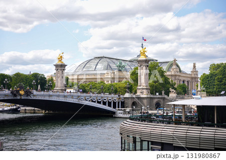 Pont Alexandre III bridge and Grand Palais over the Seine River in Paris, France 131980867