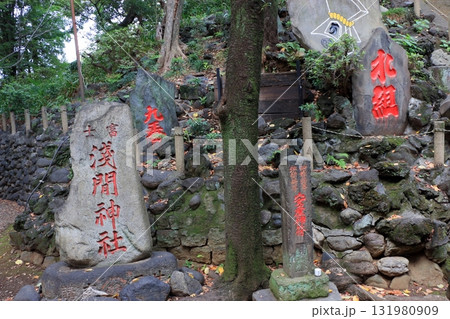 Komagome Fuji Jinja in Bunkyo-ku Tokyo Japan is a Shinto Shrine on a manmade hill called a Fujizaka using rocks from Mt. Fuji, founded around 1573 and dedicated to Japanese firefighters.  131980909