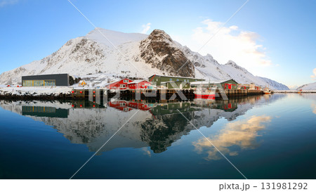 Unbelivable winter sunrise over Ramberg village and harbour. 131981292