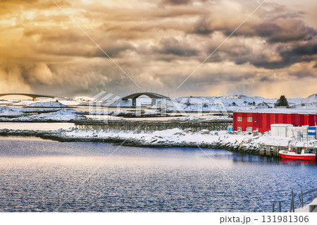 Amazing morning view of small fishing village Ramberg and  Fredvang bridge at sunset. 131981306