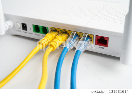 Ethernet cable with wireless router connect to internet service provider internet network. 131981614