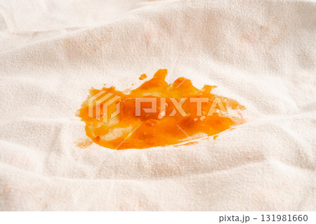 Dirty tomato sauce stain or ketchup on cloth to wash with washing powder, cleaning housework. Dirty tomato sauce stain or ketchup on cloth to wash with washing powder, cleaning housework. 131981660