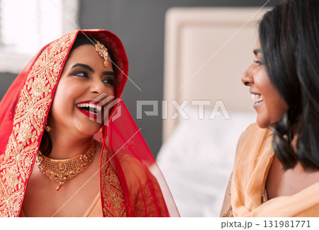 Laughing, bride and bridesmaid getting ready for a wedding, happy and helping in a room. Support, love and a young woman in traditional Indian clothes for marriage ceremony with a friend or sister Laughing, bride and bridesmaid getting ready for a wedding, happy and helping in a room. Support, love and a young woman in traditional Indian clothes for marriage ceremony with a friend or sister 131981771