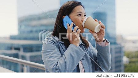 Coffee, phone call and a business asian woman in a city for communication or networking on an opportunity. Vision, mobile and contact with a young employee talking while drinking tea in an urban town Coffee, phone call and a business asian woman in a city for communication or networking on an opportunity. Vision, mobile and contact with a young employee talking while drinking tea in an urban town 131982179