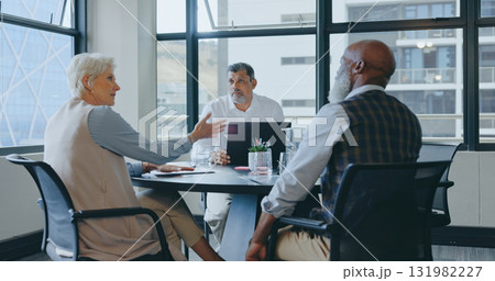 Crisis, problem and business people in meeting with laptop, documents and planning for company strategy or solution to mistake. Frustrated, woman and team with report of debt or fail on project 131982227