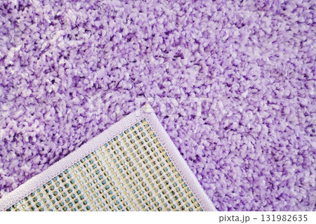 close-up. violet Interior pile carpet made of polypropylene. close-up. violet Interior pile carpet made of polypropylene. 131982635