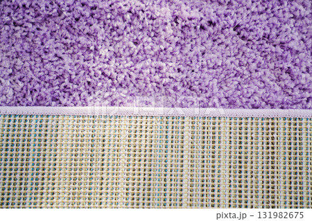 close-up. violet Interior pile carpet made of polypropylene. close-up. violet Interior pile carpet made of polypropylene. 131982675