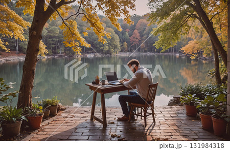 Woman is smiling and looking out the window of a train. The train is traveling through a lush green countryside Woman is smiling and looking out the window of a train. The train is traveling through a lush green countryside 131984318