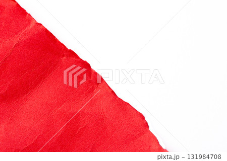 Red torn cardboard on a white background Red torn cardboard on a white background 131984708