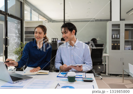 Asian business team collaboration, office project review or strategy meeting. Asian business team collaboration, office project review or strategy meeting. 131985800