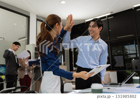 Business team creative businesspeople coworker in office Happy to be successful partnership teamwork success concept. 131985802