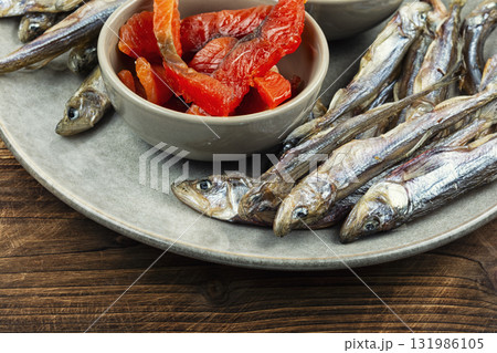 Dried salted fish, delicious snack for beer. Dried salted fish, delicious snack for beer. 131986105