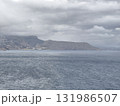 Witness the Serene Coastal View Under Dramatic Cloudy Skies That Inspire Adventure and Peace 131986507