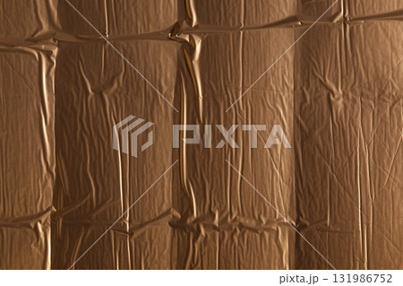 foil surface material with creases and grains texture 131986752