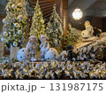A festive and cosy indoor scene featuring a Christmas or Winter holiday display, likely within a hotel lobby 131987175