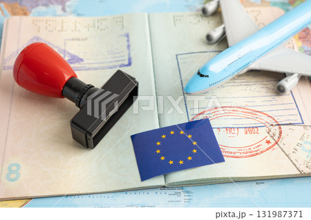 EU flag with passport and airplane for travel. 131987371