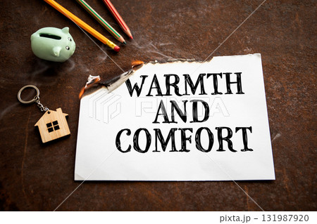 Warmth and comfort concept with burning paper showing text warmth and comfort Warmth and comfort concept with burning paper showing text warmth and comfort 131987920