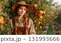 A proud female farmer stands smiling beneath a pomegranate tree, showcasing healthy, organic fruit, symbolizing agricultural business, natural food, and harvest joy. AI Generated 131993666