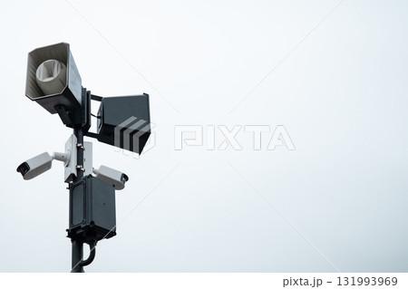 Lots of CCTV cameras on a high pole 131993969