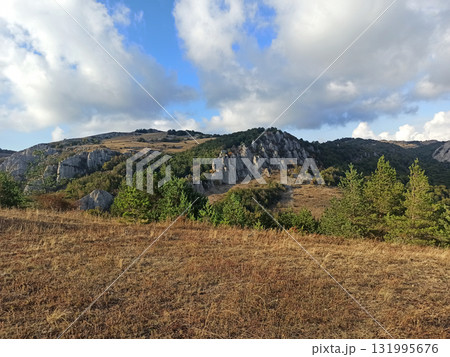beautiful landscape view with clouds from mountain Demerdjy . sunset evening. Crimea, Russia beautiful landscape view with clouds from mountain Demerdjy . sunset evening. Crimea, Russia 131995676