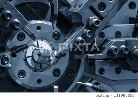Close up scene operation of the coil spring making machine. 131995855