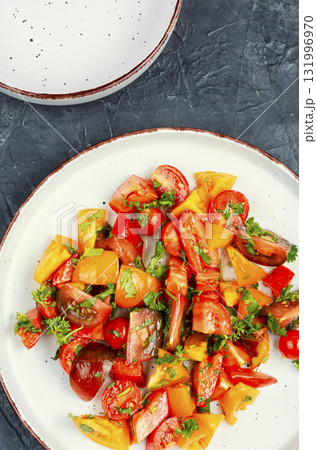 Fresh salad with tomatoes. 131996970