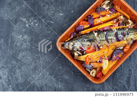 Fried mackerel with baked sweet potato. 131996975