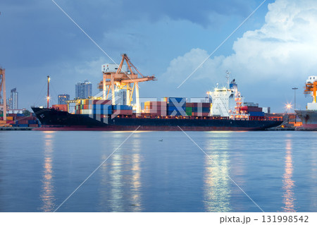Crane and cargo ship at port in Bangkok City of Thailand. Crane and cargo ship at port in Bangkok City of Thailand. 131998542