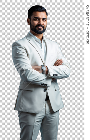 A South Asian male entrepreneur in a crisp white suit, standing confidently with arms crossed, surrounded by glowing blueprints 131998545