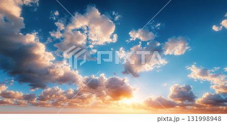 Beautiful white fluffy clouds on blue sky in the sunrise 131998948