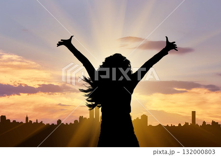 Silhouette of a happy and successful business woman 132000803