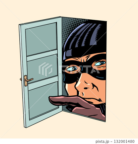 A criminal is looking through an open door. Theft of personal data by fraudsters. The danger of accessing unverified sites. A criminal is looking through an open door. Theft of personal data by fraudsters. The danger of accessing unverified sites. 132001480