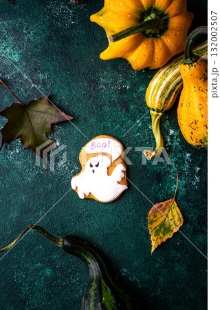 Halloween cookies in shape of ghost, jack-o-lantern and skull 132002507