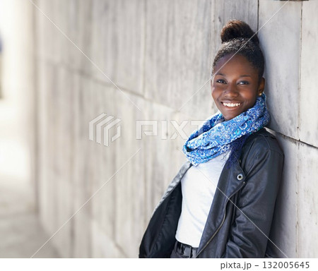 Portrait, urban fashion and black woman at wall with smile, graffiti and mockup standing at street art. Happiness, youth and happy face of gen z model in African city with streetwear and sunshine. 132005645
