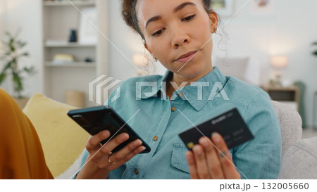 Home, smartphone and woman on a couch, credit card or online payment with finance, budget or ecommerce. Person, shopper or girl on a sofa, cellphone or banking with transaction, investment or savings Home, smartphone and woman on a couch, credit card or online payment with finance, budget or ecommerce. Person, shopper or girl on a sofa, cellphone or banking with transaction, investment or savings 132005660