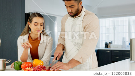 Cooking, couple and together in kitchen and learning for relationship growth and bonding, skill development and support. Young man, woman and cook Italian food, help and advice, spending quality time Cooking, couple and together in kitchen and learning for relationship growth and bonding, skill development and support. Young man, woman and cook Italian food, help and advice, spending quality time 132005838