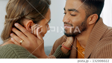 Couple, closeup and touch to face, love and home by couch, smile and support by marriage. Happy people, together and hands for bonding, care and commitment for life, trust and quality time to romance Couple, closeup and touch to face, love and home by couch, smile and support by marriage. Happy people, together and hands for bonding, care and commitment for life, trust and quality time to romance 132006022