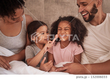Family, bedroom and bonding with children and parents in the morning playing with makeup brush feeling happy, love and joy at home. Relax, bed and having fun with man, woman and girl kids or sisters Family, bedroom and bonding with children and parents in the morning playing with makeup brush feeling happy, love and joy at home. Relax, bed and having fun with man, woman and girl kids or sisters 132006033