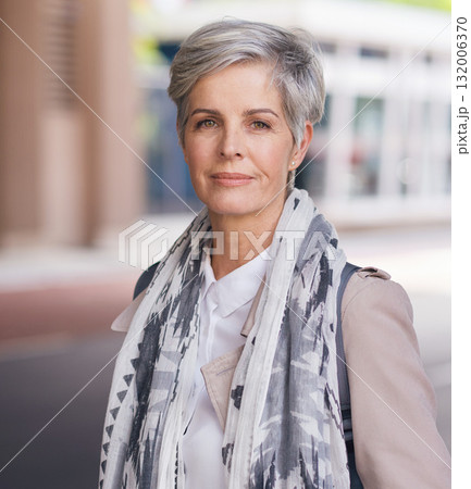 Portrait, elderly and business woman confident in an urban town or city travel for a startup company. Adventure, mature and senior female traveling international with serious face for tourism Portrait, elderly and business woman confident in an urban town or city travel for a startup company. Adventure, mature and senior female traveling international with serious face for tourism 132006370