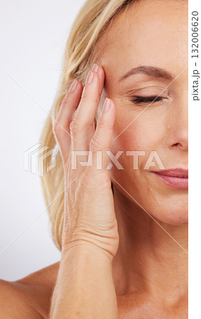 Closeup, skincare and woman with cosmetics, dermatology and morning routine against studio background. Zoom mature female and lady with grooming, luxury salon treatment and smooth skin on backdrop Closeup, skincare and woman with cosmetics, dermatology and morning routine against studio background. Zoom mature female and lady with grooming, luxury salon treatment and smooth skin on backdrop 132006620