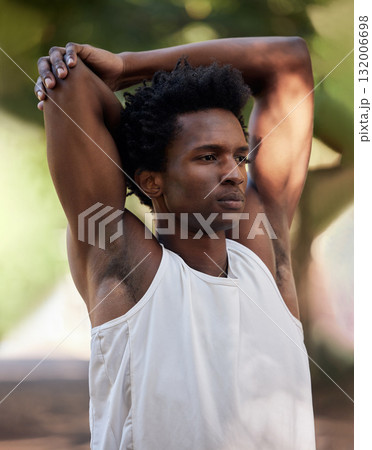 Fitness, exercise and black man stretching arms in nature to start training workout outdoors. Sports, thinking and male athlete stretch, warm up or getting ready for running, exercising or jogging. Fitness, exercise and black man stretching arms in nature to start training workout outdoors. Sports, thinking and male athlete stretch, warm up or getting ready for running, exercising or jogging. 132006698