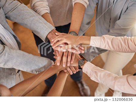 Business people, hands and teamwork in collaboration above for meeting trust, unity and community at office. Top view of group piling hand together for celebration, success or workplace team building Business people, hands and teamwork in collaboration above for meeting trust, unity and community at office. Top view of group piling hand together for celebration, success or workplace team building 132006830