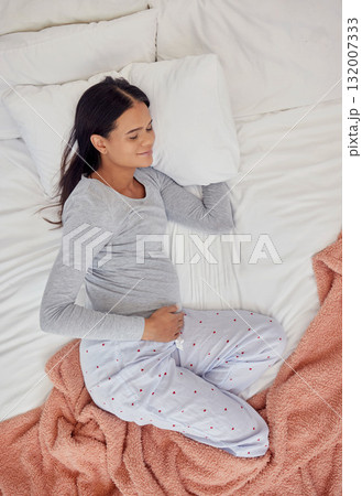 Top view, pregnant and woman sleeping in bedroom for peace, healthy childbirth and wellness. Pregnancy, tired mom and asleep for rest in house, home and relax for calm lifestyle, break and maternity 132007333