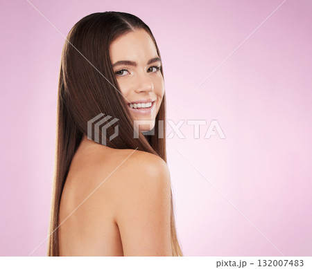 Woman, hair beauty and studio portrait with smile, wellness and cosmetics with natural skin glow by pink background. Young gen z model, makeup and cosmetic self care for shine on healthy strong locks Woman, hair beauty and studio portrait with smile, wellness and cosmetics with natural skin glow by pink background. Young gen z model, makeup and cosmetic self care for shine on healthy strong locks 132007483