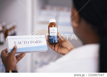 Pharmacist, pills or hands of woman with medicine bottle in drugstore for healthcare stock inventory. Zoom, clinic or nurse checking or reading label info on medical products or tablets in pharmacy Pharmacist, pills or hands of woman with medicine bottle in drugstore for healthcare stock inventory. Zoom, clinic or nurse checking or reading label info on medical products or tablets in pharmacy 132007567