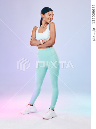 Woman, fitness and arms crossed in neon studio with smile, wellness and training clothes by background. Gen z model, training and fashion with happiness, body goals or exercise for health by backdrop Woman, fitness and arms crossed in neon studio with smile, wellness and training clothes by background. Gen z model, training and fashion with happiness, body goals or exercise for health by backdrop 132009682