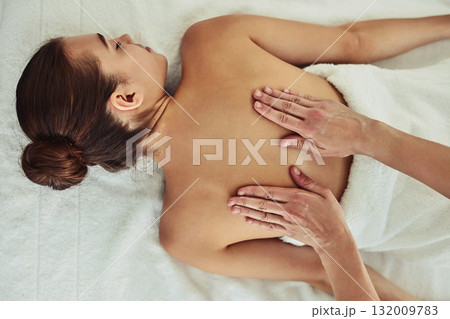 Relax, back and massage with woman in spa for wellness, luxury and cosmetics treatment from above. Skincare, peace and zen with female customer and hands of therapist for therapy, salon and detox Relax, back and massage with woman in spa for wellness, luxury and cosmetics treatment from above. Skincare, peace and zen with female customer and hands of therapist for therapy, salon and detox 132009783
